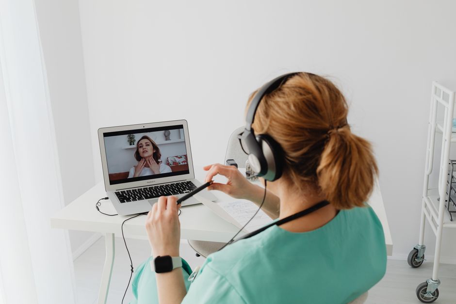 A doctor on a video consultation